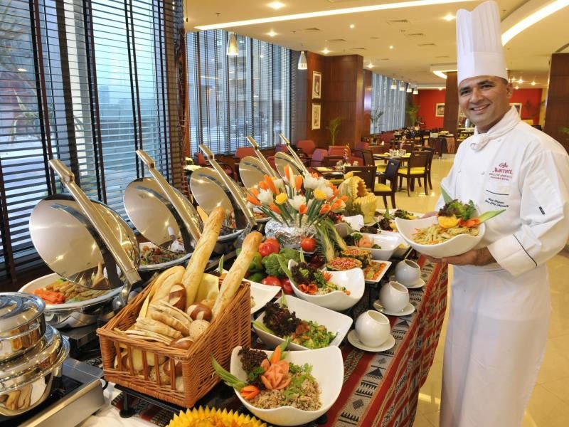Marriott Executive Apartments Manama, Bahrain Exterior foto A buffet at a hotel